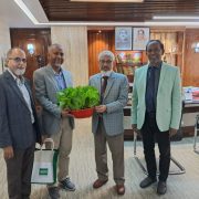 A Green Gesture: Dr. Shohael Gifts Hydroponic Lettuce to the Vice-Chancellor of Sher-e-Bangla Agricultural University, Bhuiyan